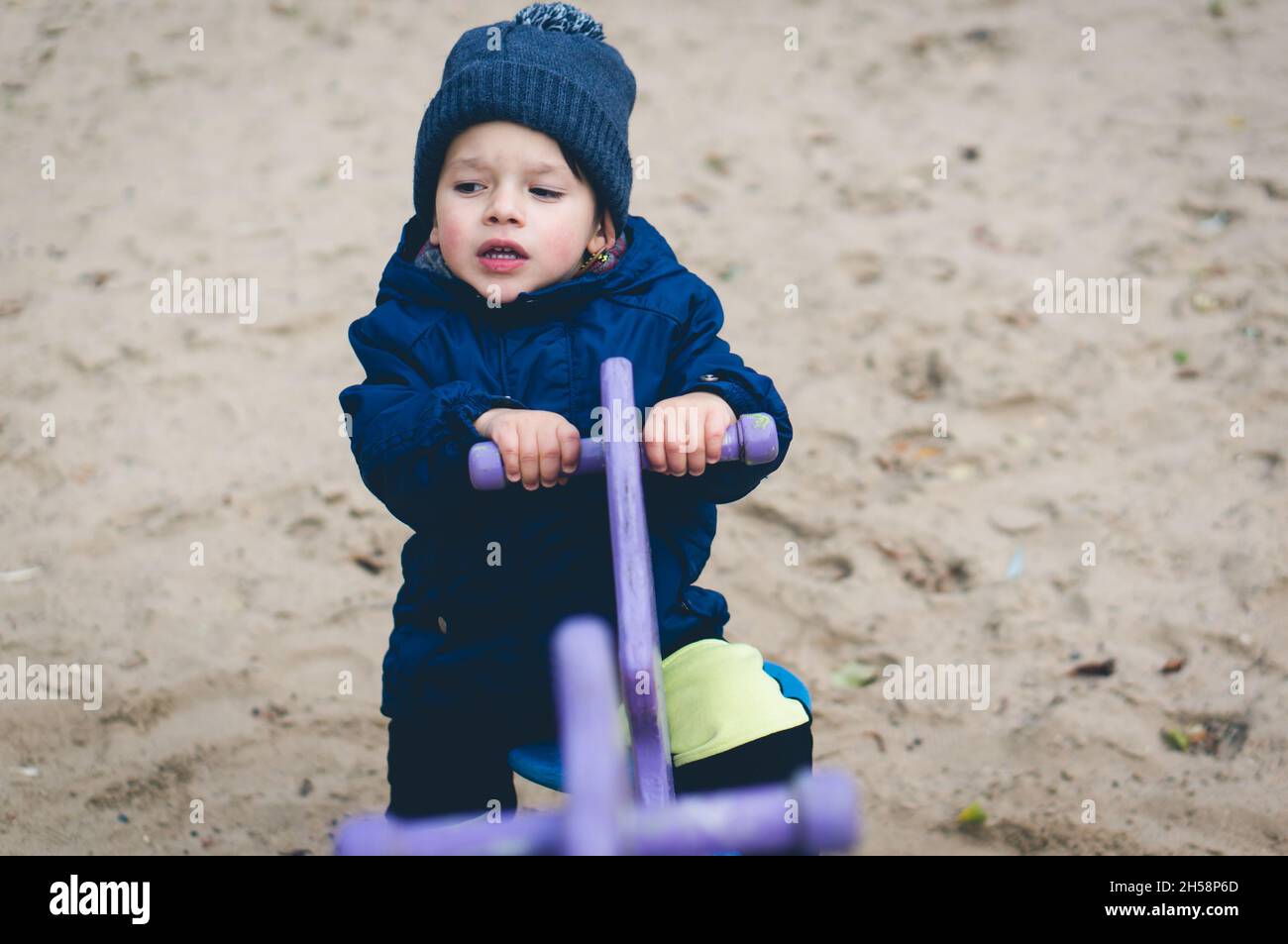 A cute little caucasian boy on a playground Stock Photo - Alamy
