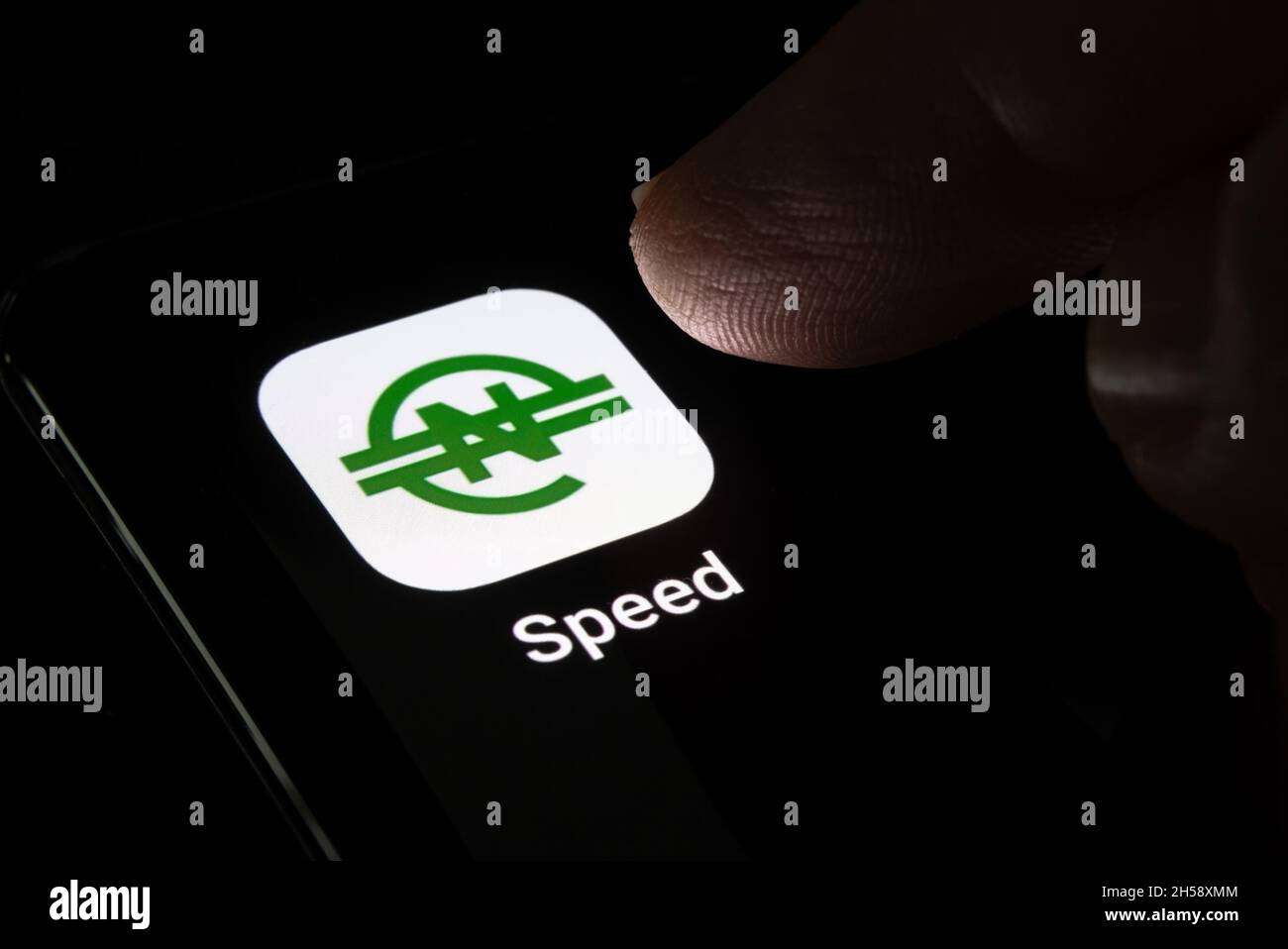 Speed wallet app for eNaira  currency seen on glowing screen of smartphone. Africa’s first digital currency. Stafford, United Kingdom, November 7, 202 Stock Photo