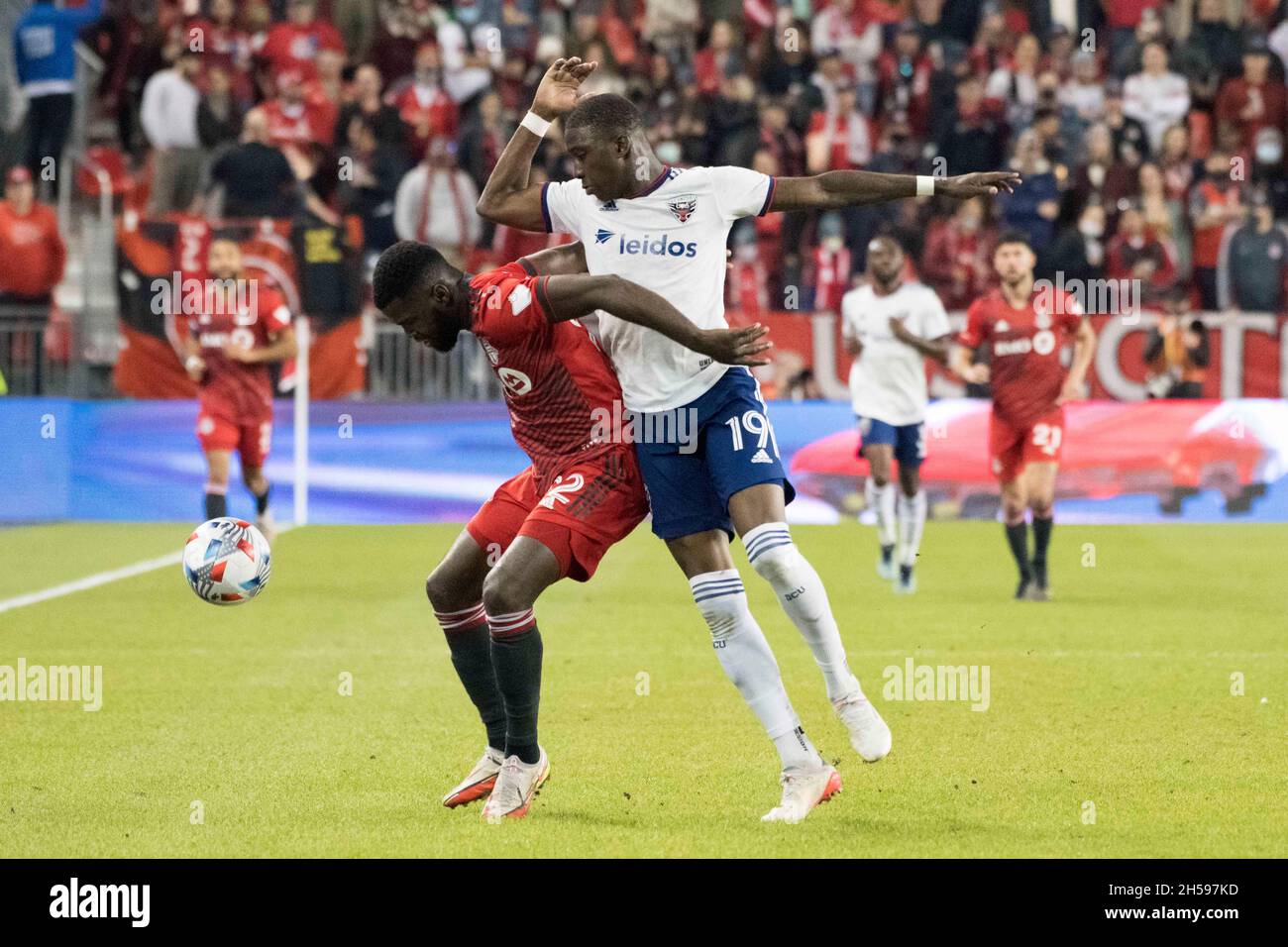 Toronto, Ontario, Canada. 7th Nov, 2021. Kemar Lawrence (92) and Nigel Robertha (19) in action during the MLS game between between Toronto FC and DC United. The game ended 1-3 (Credit Image: © Angel Marchini/ZUMA Press Wire) Stock Photo