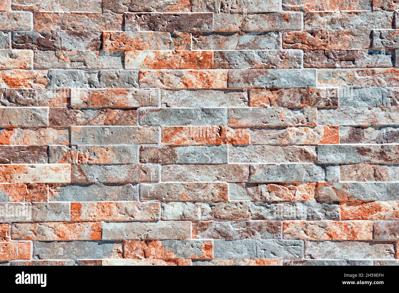 Close up of a stone wall texture, bricks with a pattern Stock Photo