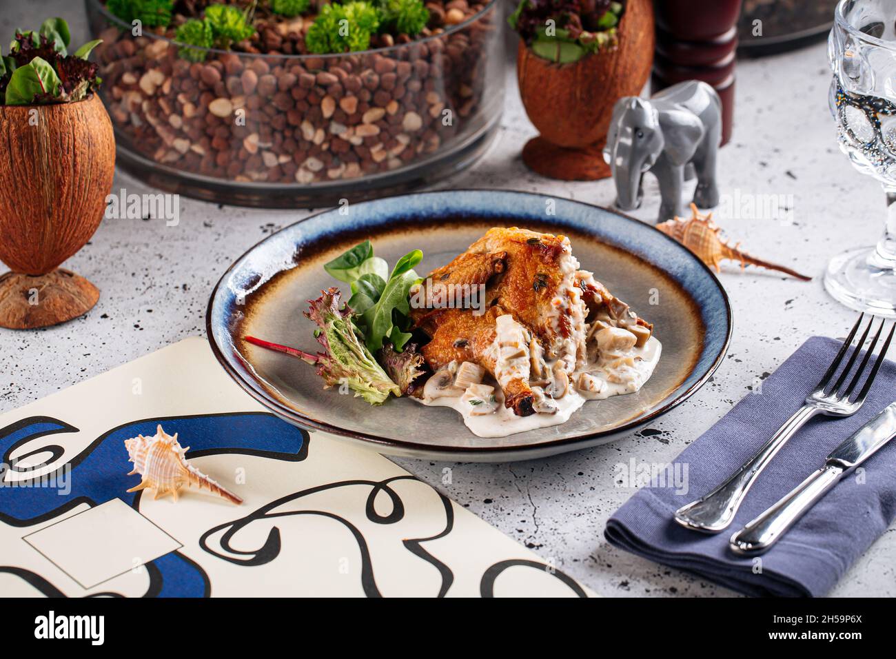 Portion of gourmet chicken fillet in cream sauce Stock Photo