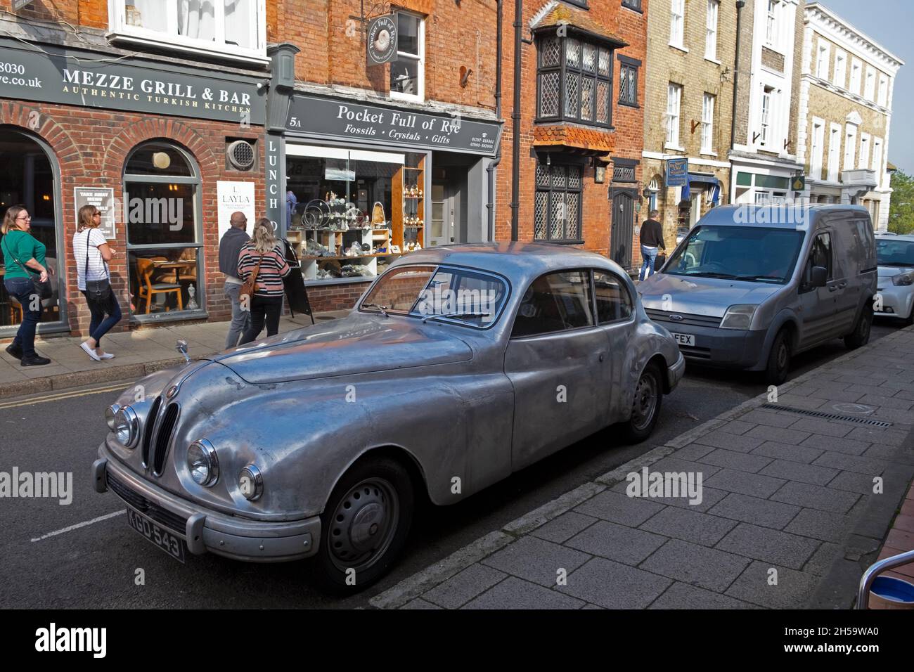 Silver classic vintage Bristol 403 1950s car parked outside shops in street Rye East Sussex England UK in autumn 2021   KATHY DEWITT Stock Photo