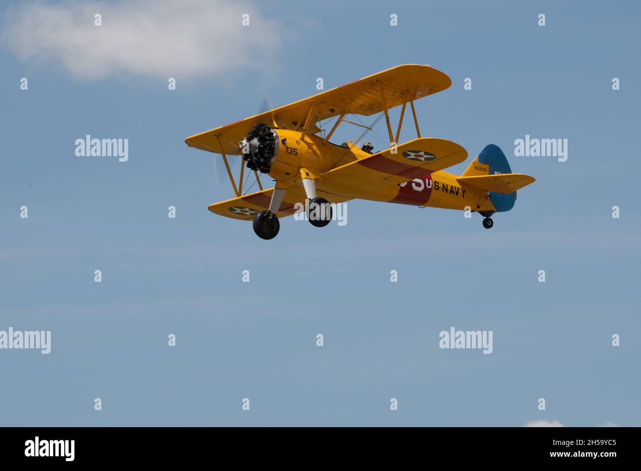 Flying aircraft against a blue sky during an airshow Stock Photo - Alamy