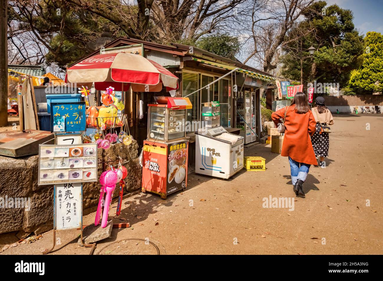 22 March 2019: Tokyo, Japan - Shop selling food and souvenirs in Ueno Onshi Park, Tokyo, in spring. Stock Photo