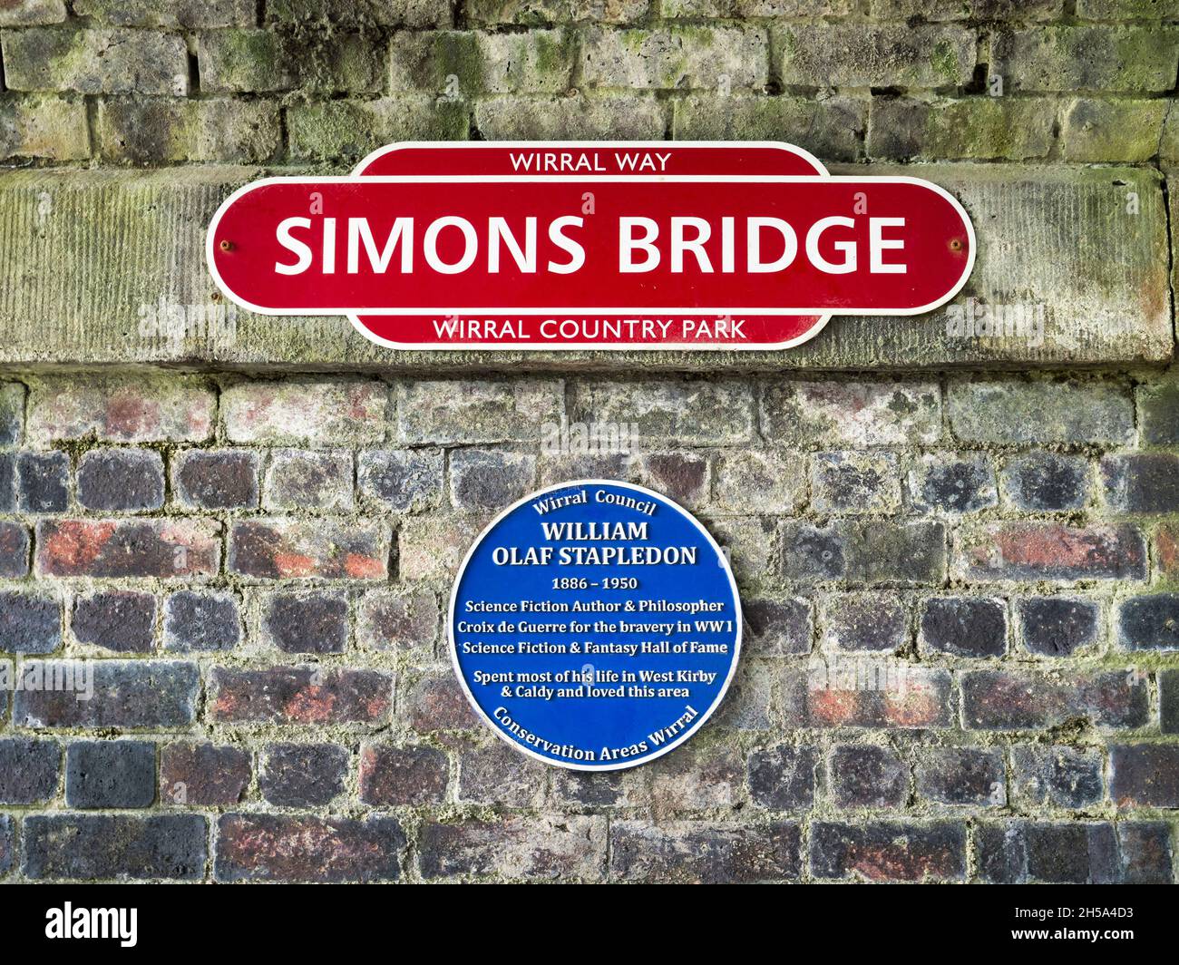 Blue plaque commemorating Science Fiction author Olaf Stapledon on the Wirral Wayl near West Kirby, Merseyside. Stock Photo