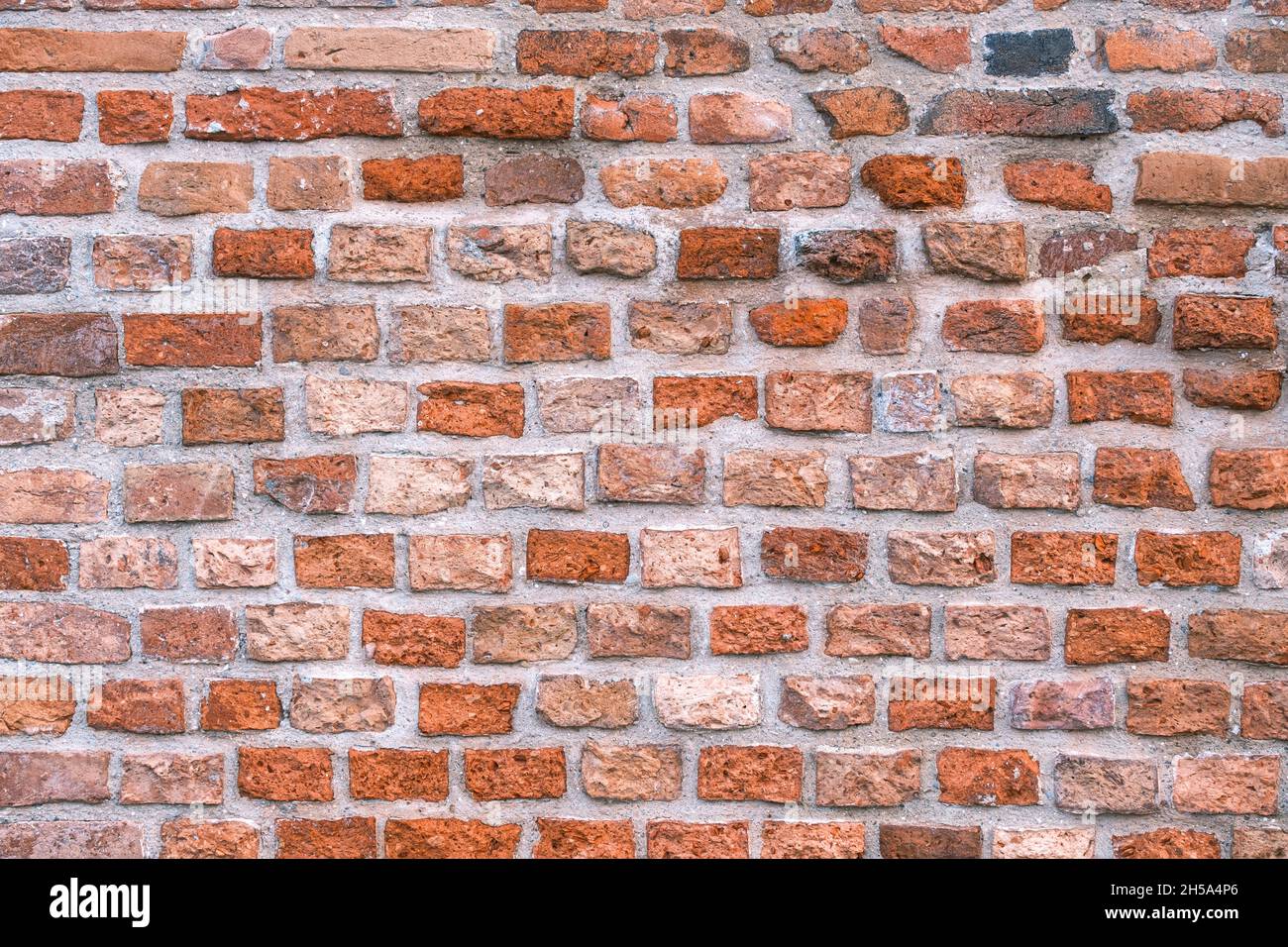 medieval brick wall - old orange and white bricks texture Stock Photo