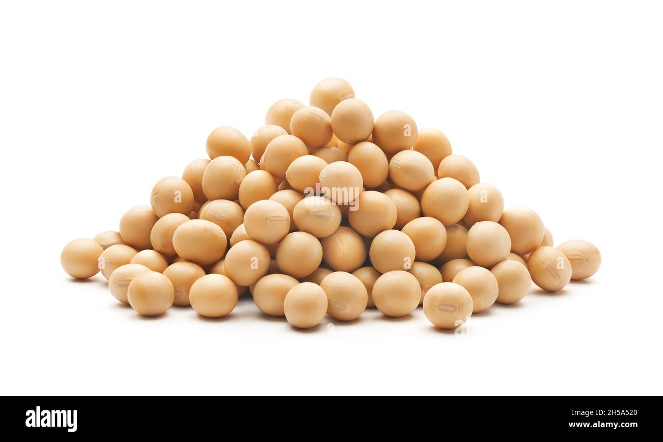 Stacked soybeans isolated on white background Stock Photo