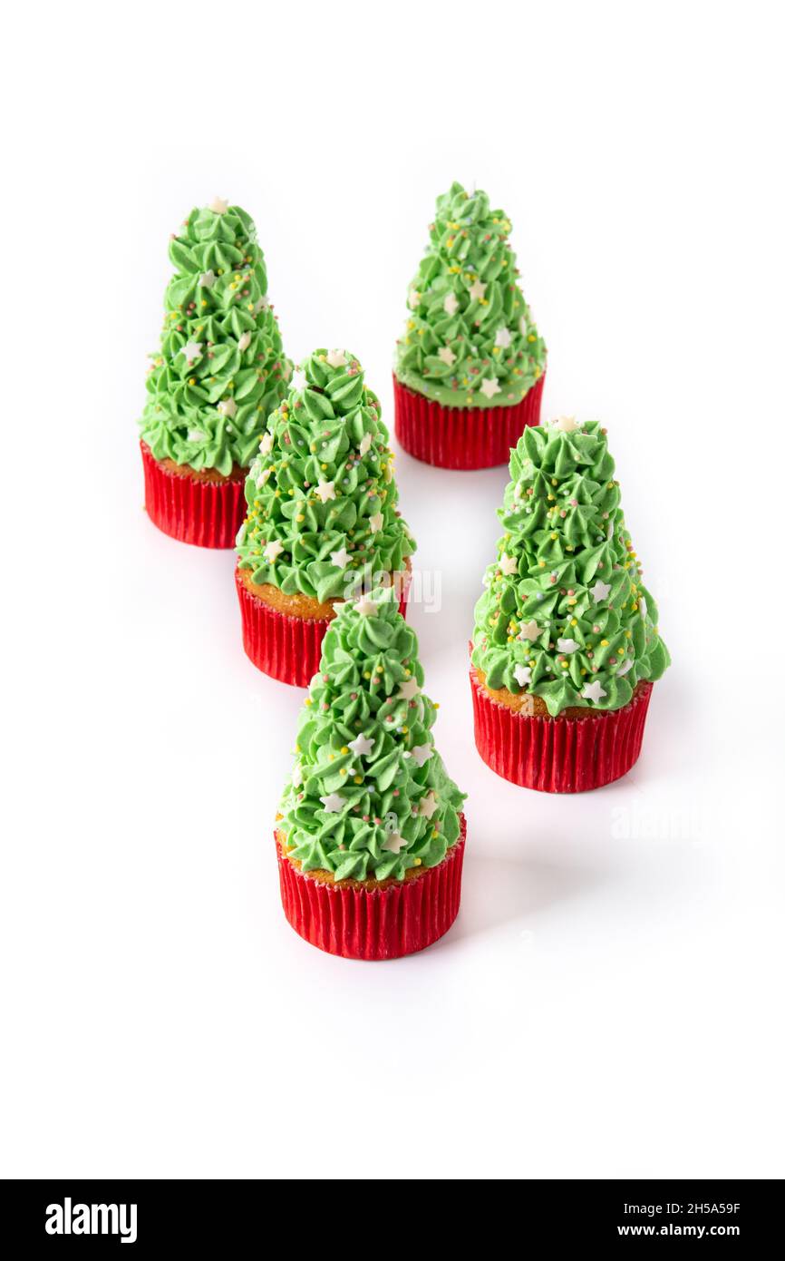 Christmas tree cupcakes isolated on white background Stock Photo