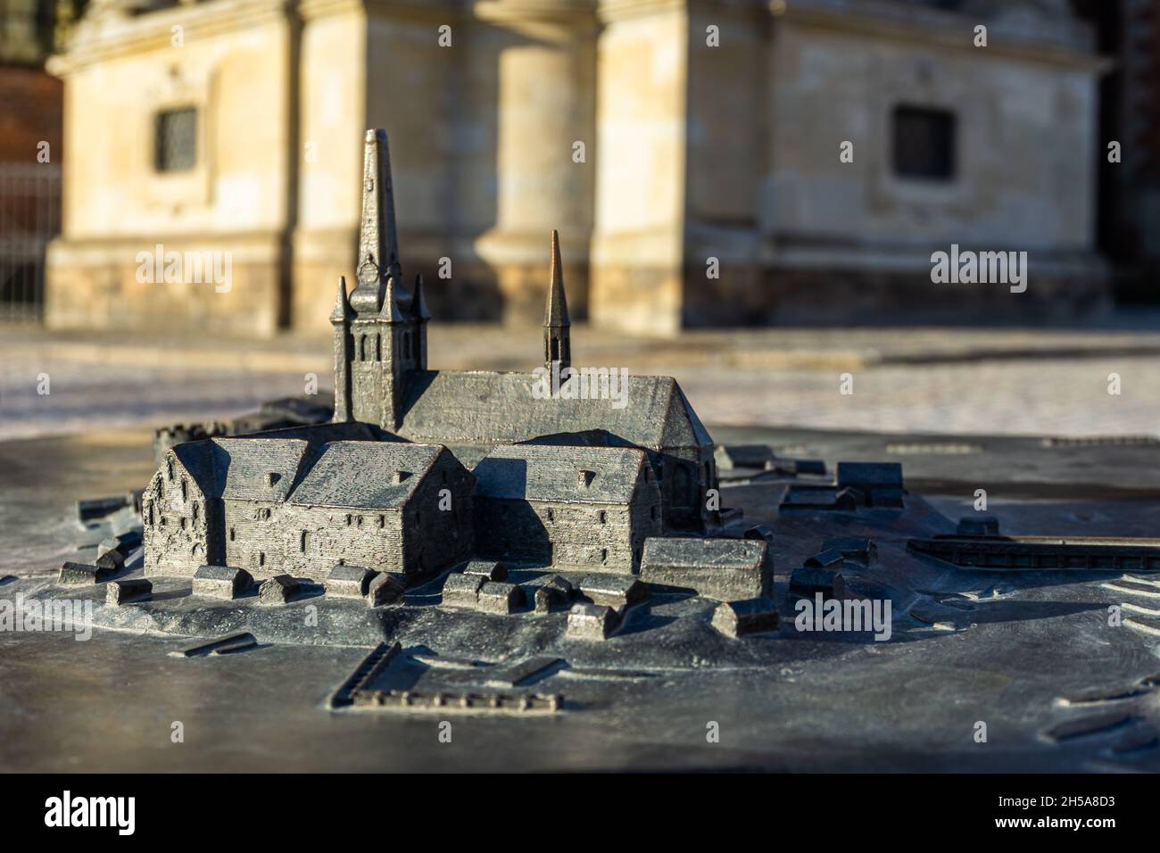 Stockholm, Sweden - April 3, 2021: Model of church and historical buildings on Riddarholmen in bronze and near the authentic cathedral where Swedish k Stock Photo