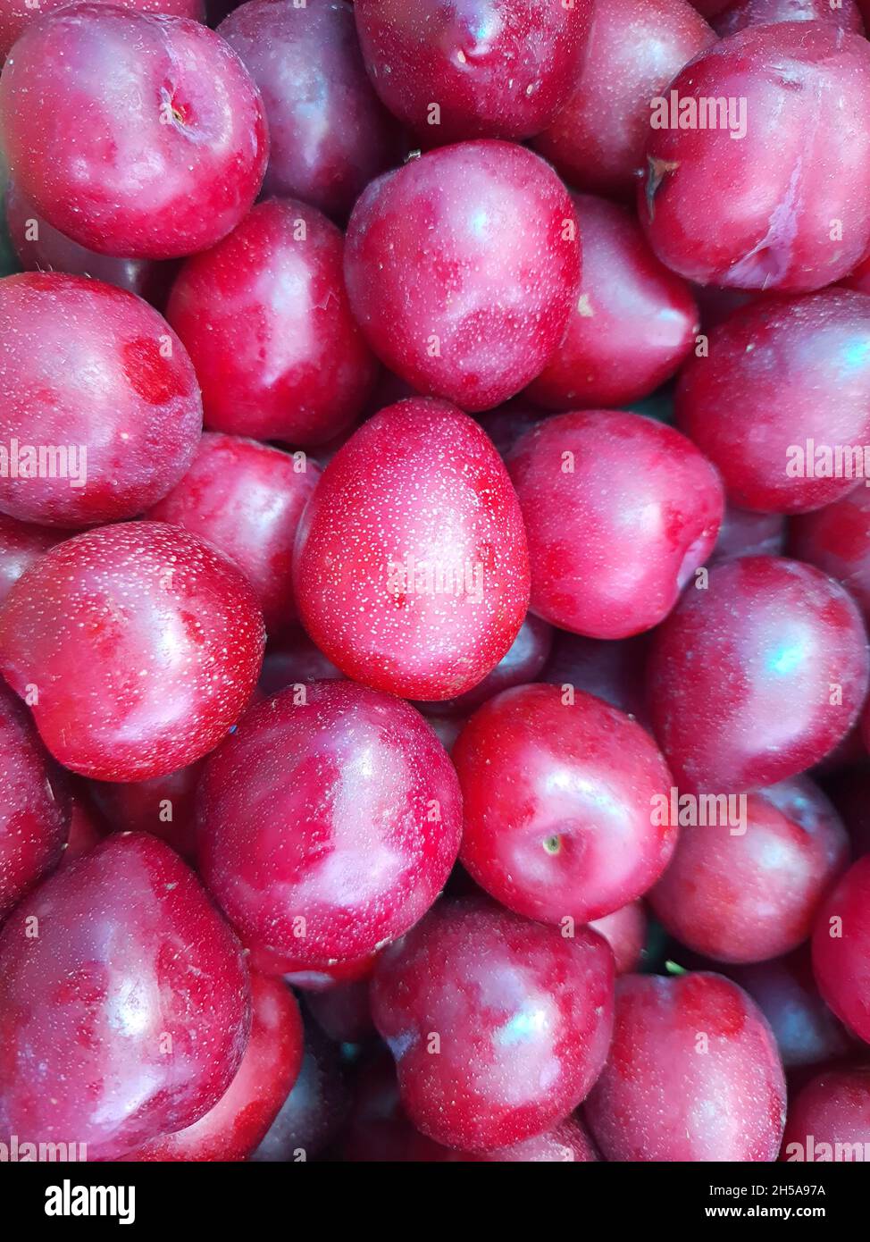Plums, in a market, full screen Stock Photo Alamy