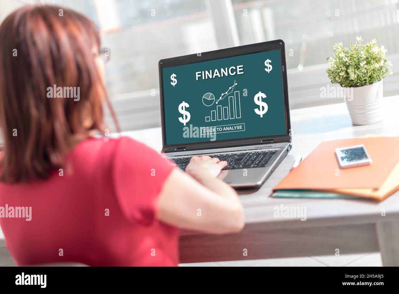 Laptop screen displaying a finance concept Stock Photo - Alamy