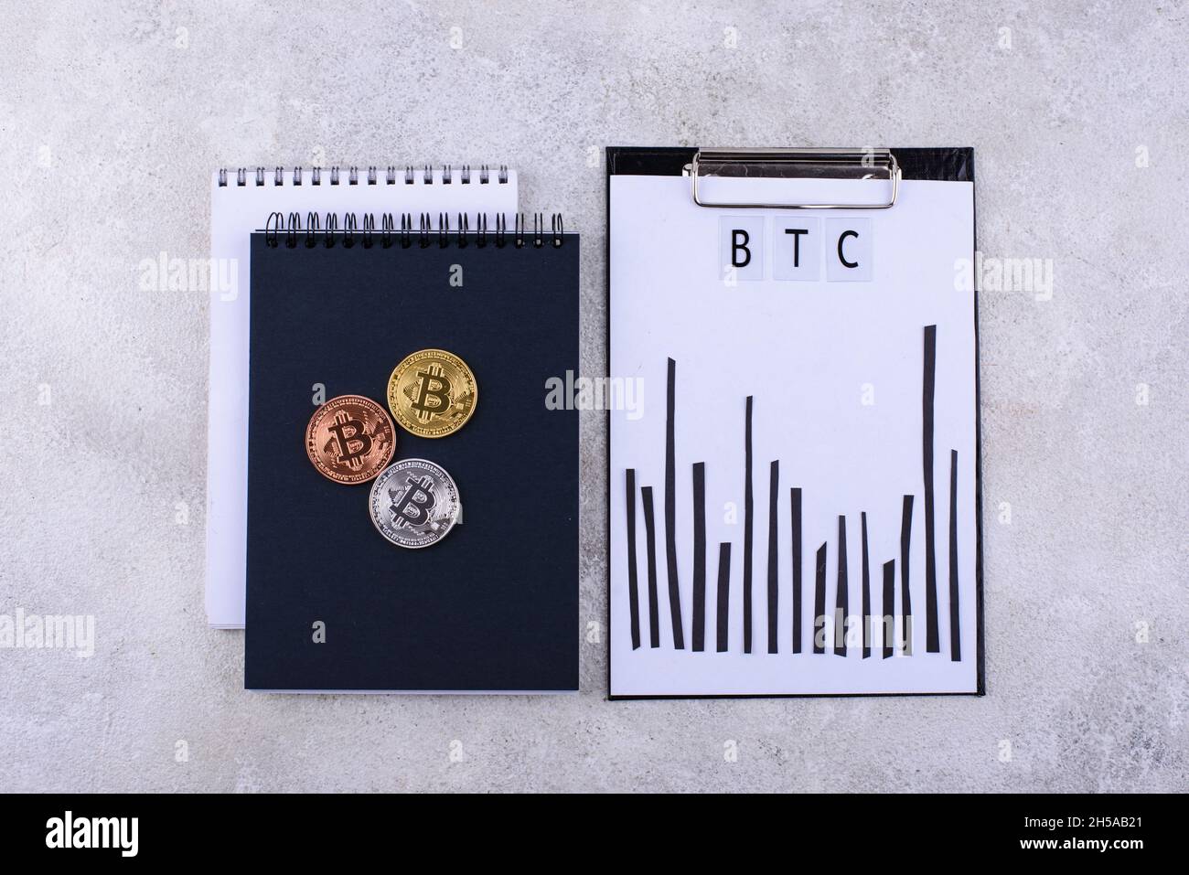 Bitcoin shedule on desk. Cryptocurrency concept Stock Photo