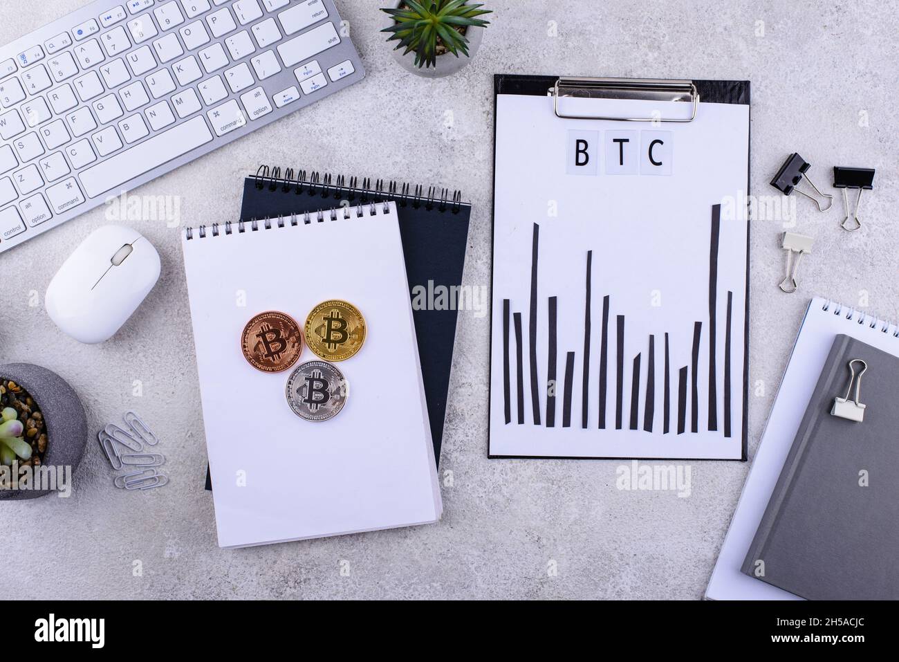 Bitcoin shedule on desk. Cryptocurrency concept Stock Photo