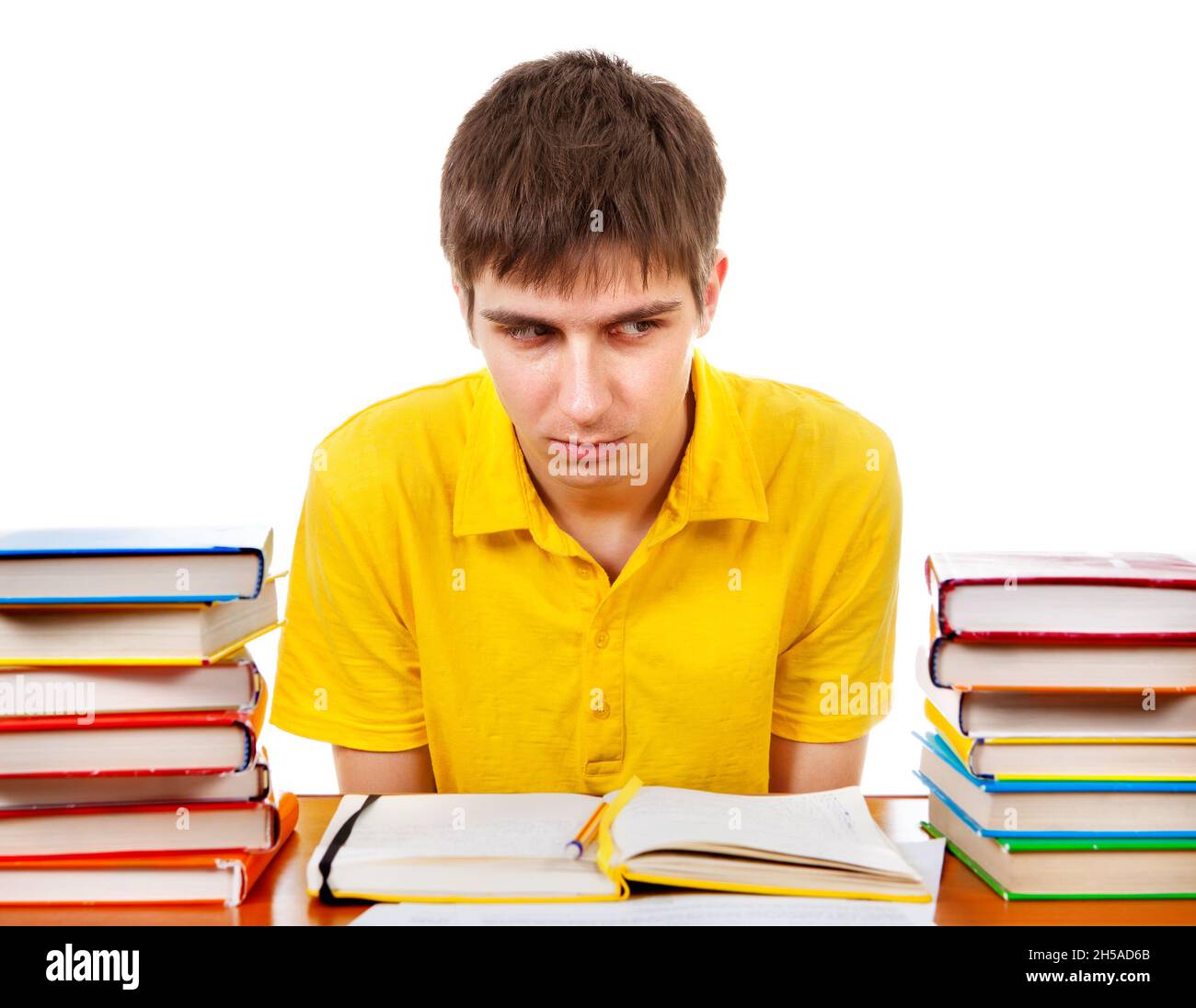 Annoyed Student on the School Desk Isolated on the White Background Stock Photo Alamy