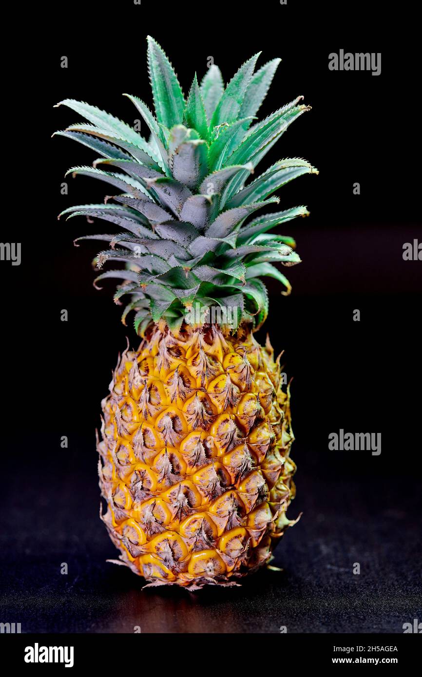 close up ripe pineapple on table Stock Photo