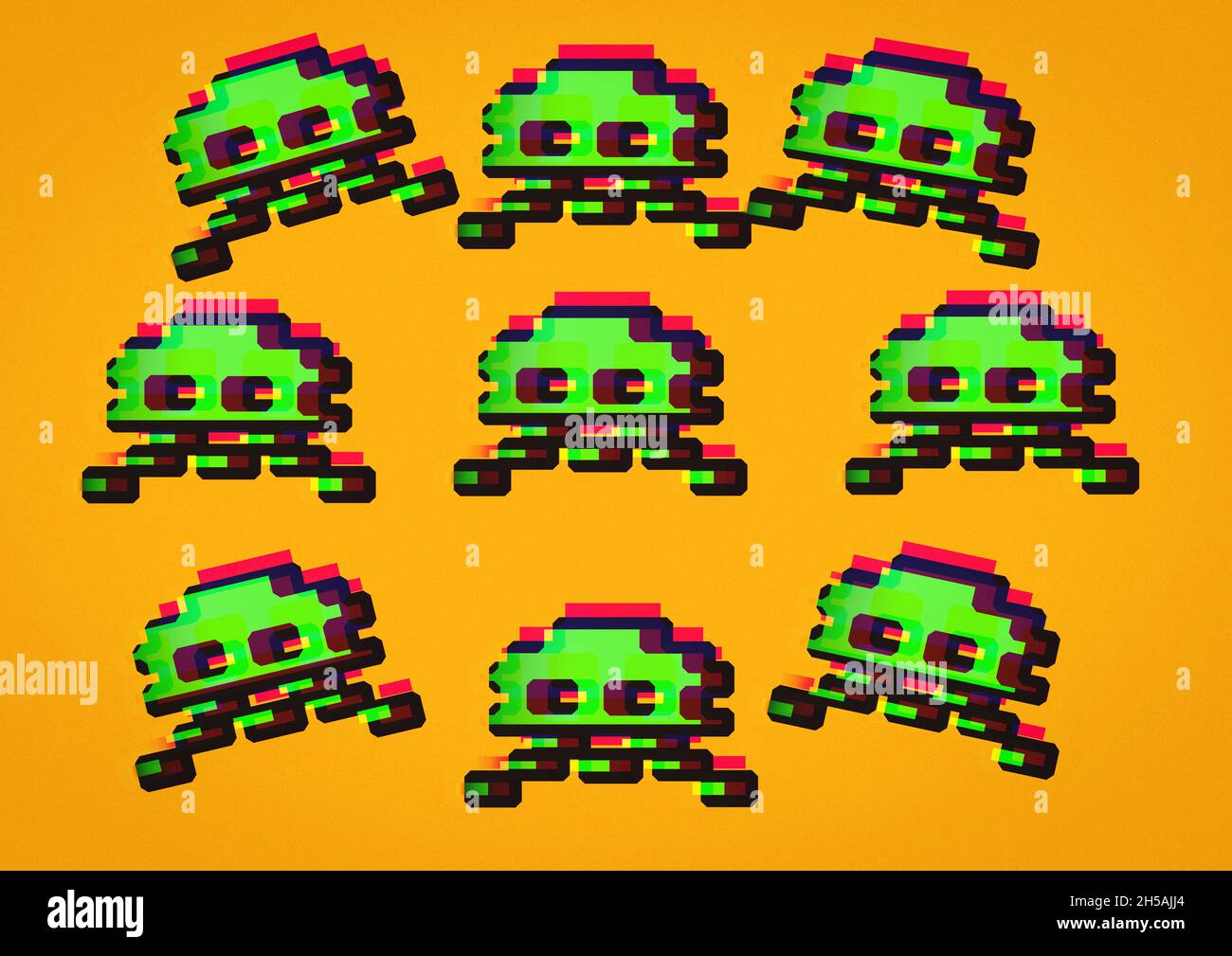 Retro 8-Bit Pixel art Space Alien invaders on a orange background Stock Photo