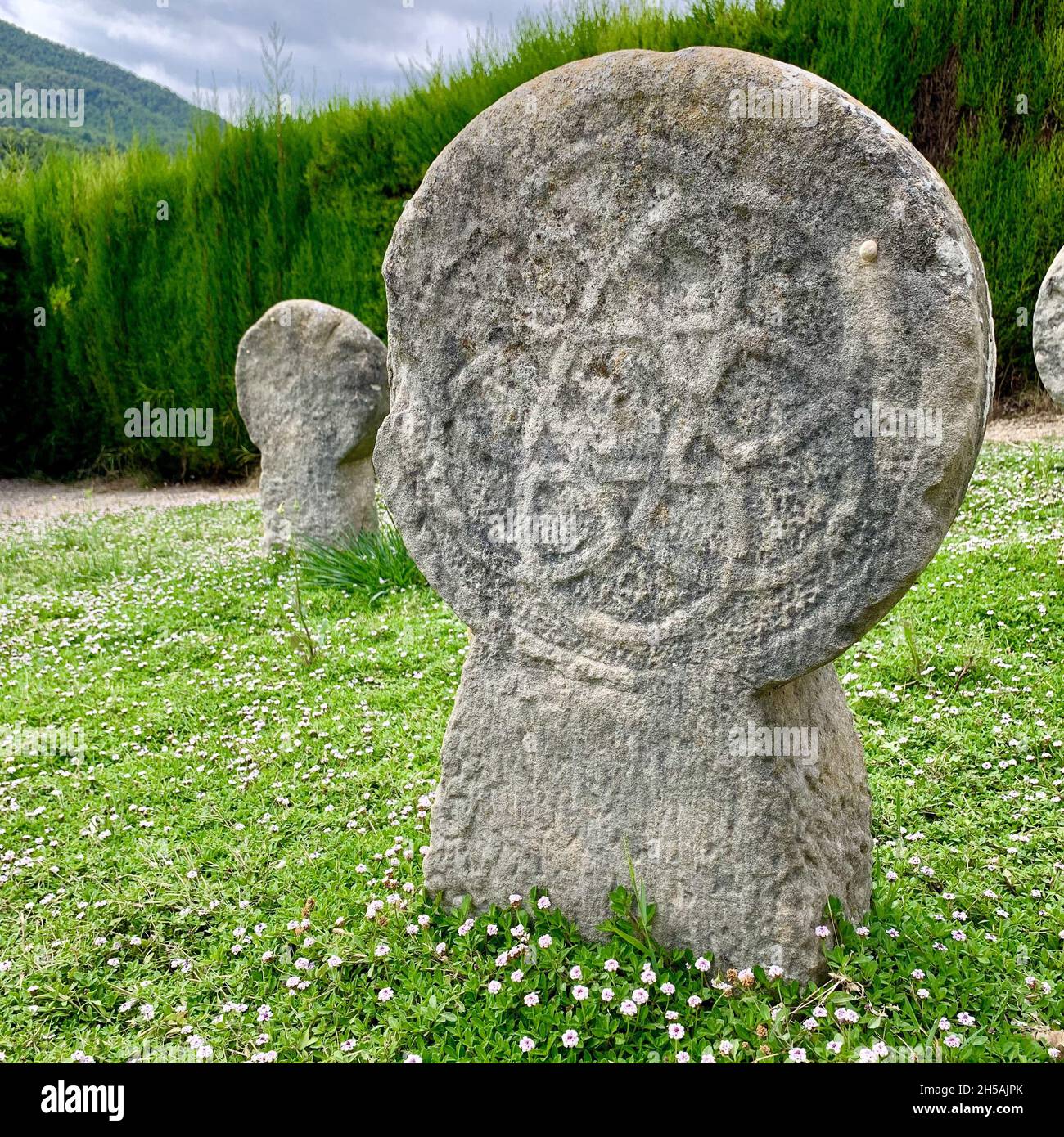 Ancient Celtic sign stone stele in a green ceremony Stock Photo Alamy