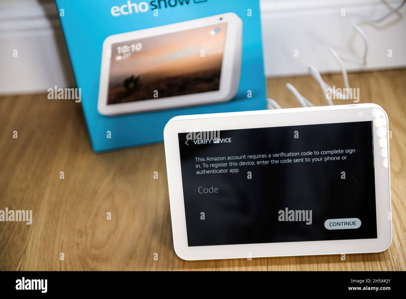 Display screen during unboxing of Amazon Alexa Echo personal IOT device  from Amazon with a request for verification code to sign in or  authenticator Stock Photo - Alamy