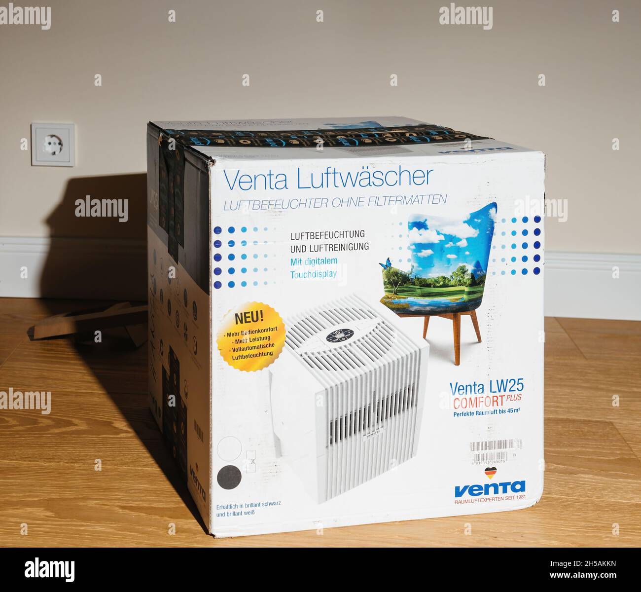 Cardboard box of Venta Airwasher Humidifier without filter pads model LW25  comfort plus with display - new package before unboxing on the living room  Stock Photo - Alamy