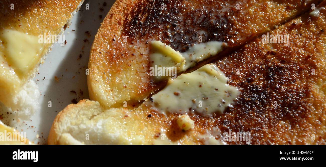toasted white bread with butter Stock Photo Alamy