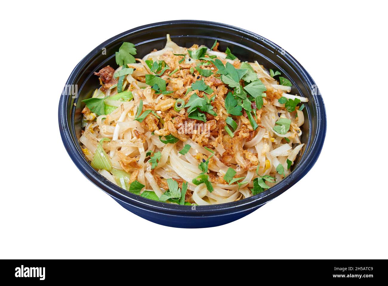 Delivery round box with pad thai noodles. Isolated with clipping path Stock Photo