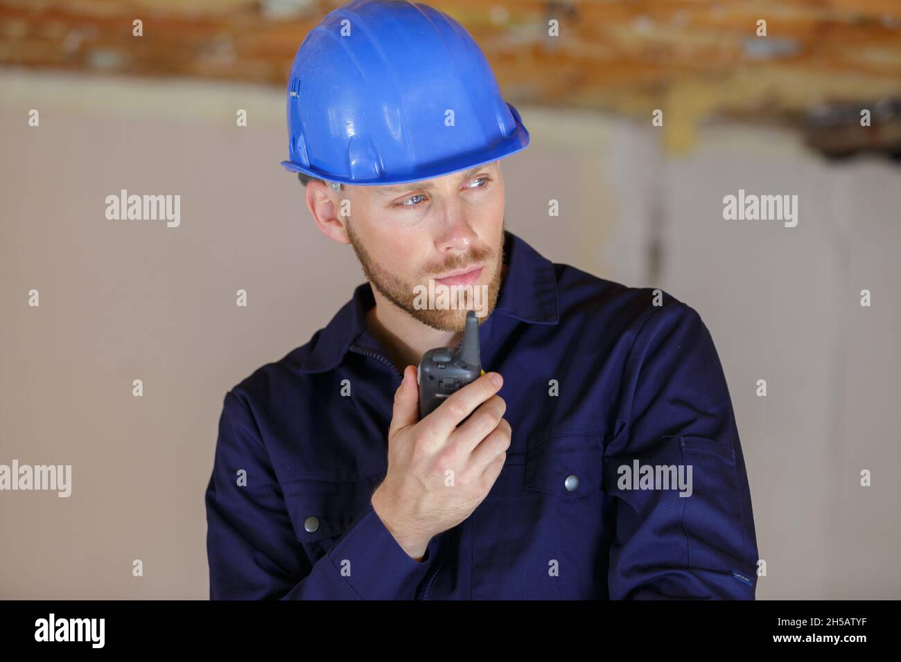 smart engineer using a walkie talkie Stock Photo