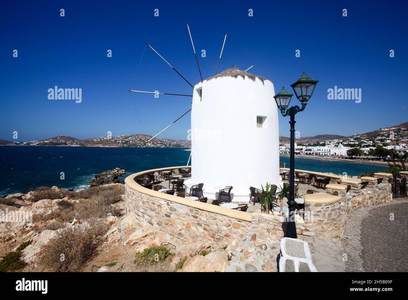 Traditional windmill on Antiparos, a small Greek island in the southern Aegean, at the heart of the Cyclades, Near Paros Stock Photo