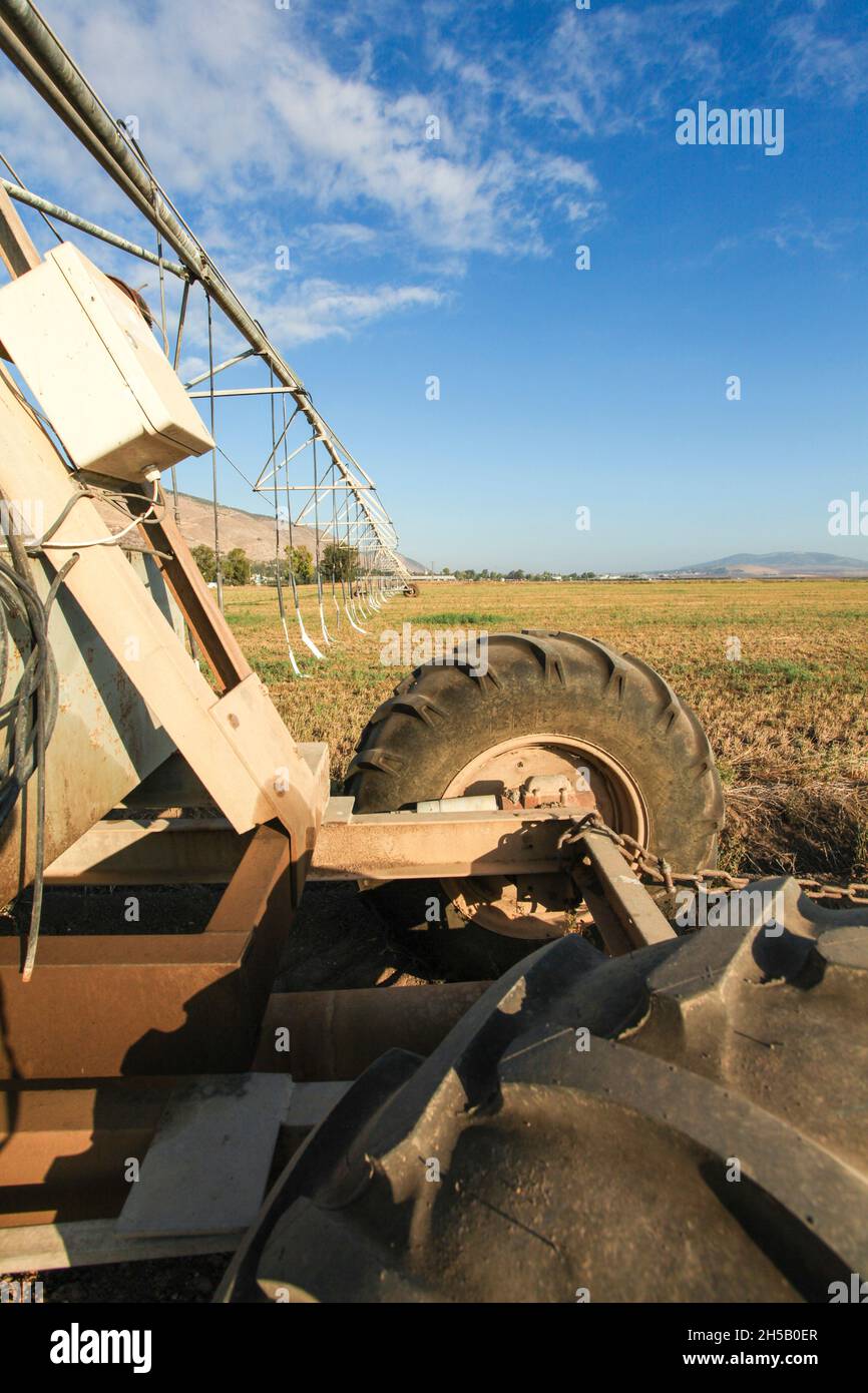 Mobile Irrigation Robot in a field. Photographed in the Jezreel Valley, Israel Stock Photo