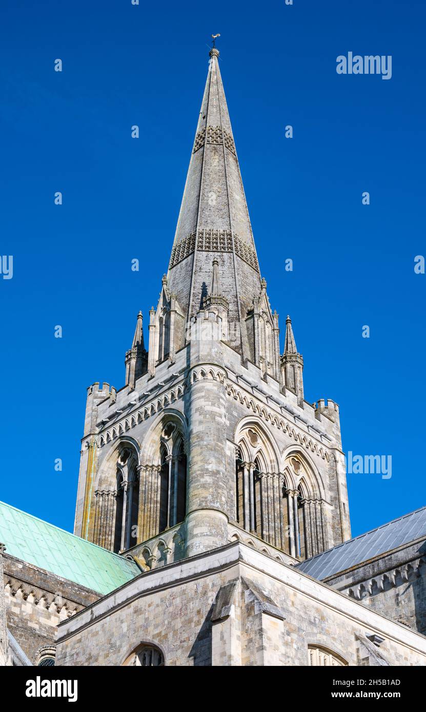 Spire on Chichester Cathedral against blue sky in City of Chichester, West Sussex, England, UK. Stock Photo