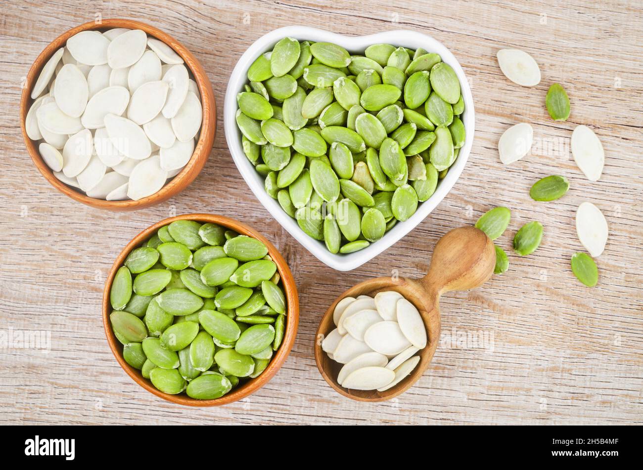 Roasted salty pumpkin seeds hi-res stock photography and images - Alamy