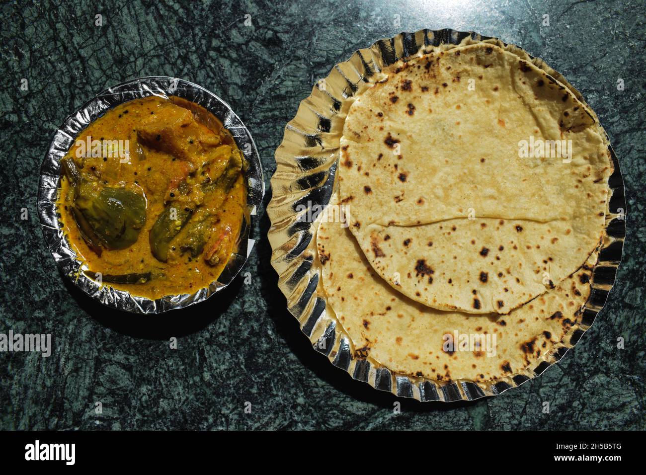 Delicious Alu Baingan gravy ki sabji. Indian curry of potato and eggplant or brinjal gravy