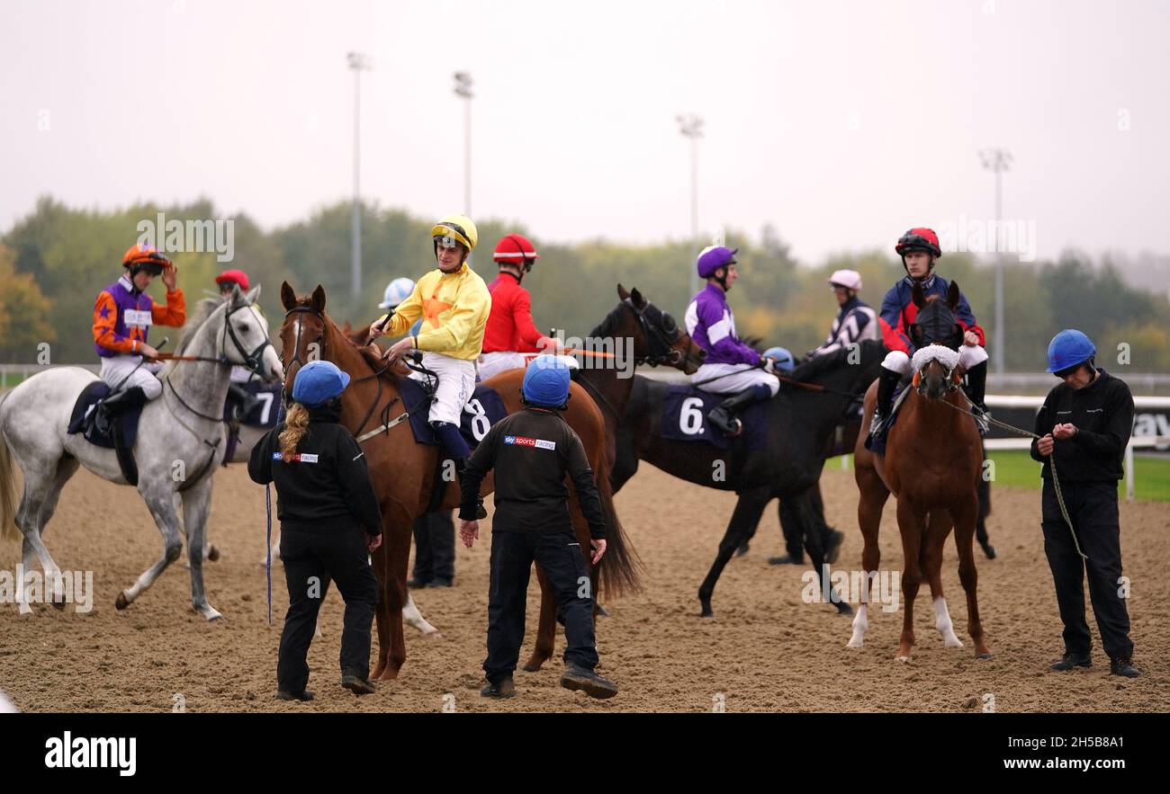 Horse handlers with the runners and riders before the Watch Racing Free