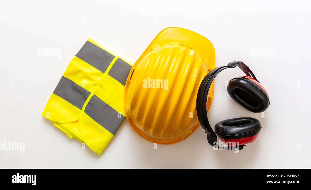 Safety equipment helmet vest and ear muffs. Work wear protection