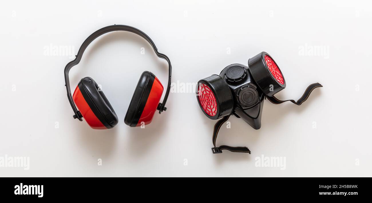Safety equipment ear muffs and respiratory mask. Work wear noise and