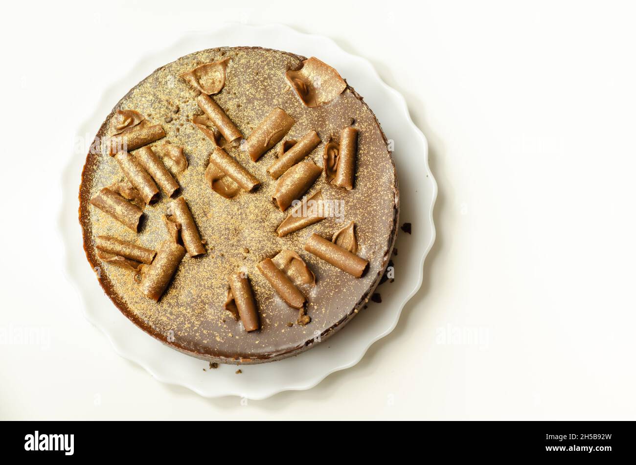 Digestive biscuit base with chocolate cheesecake and pockets of salted