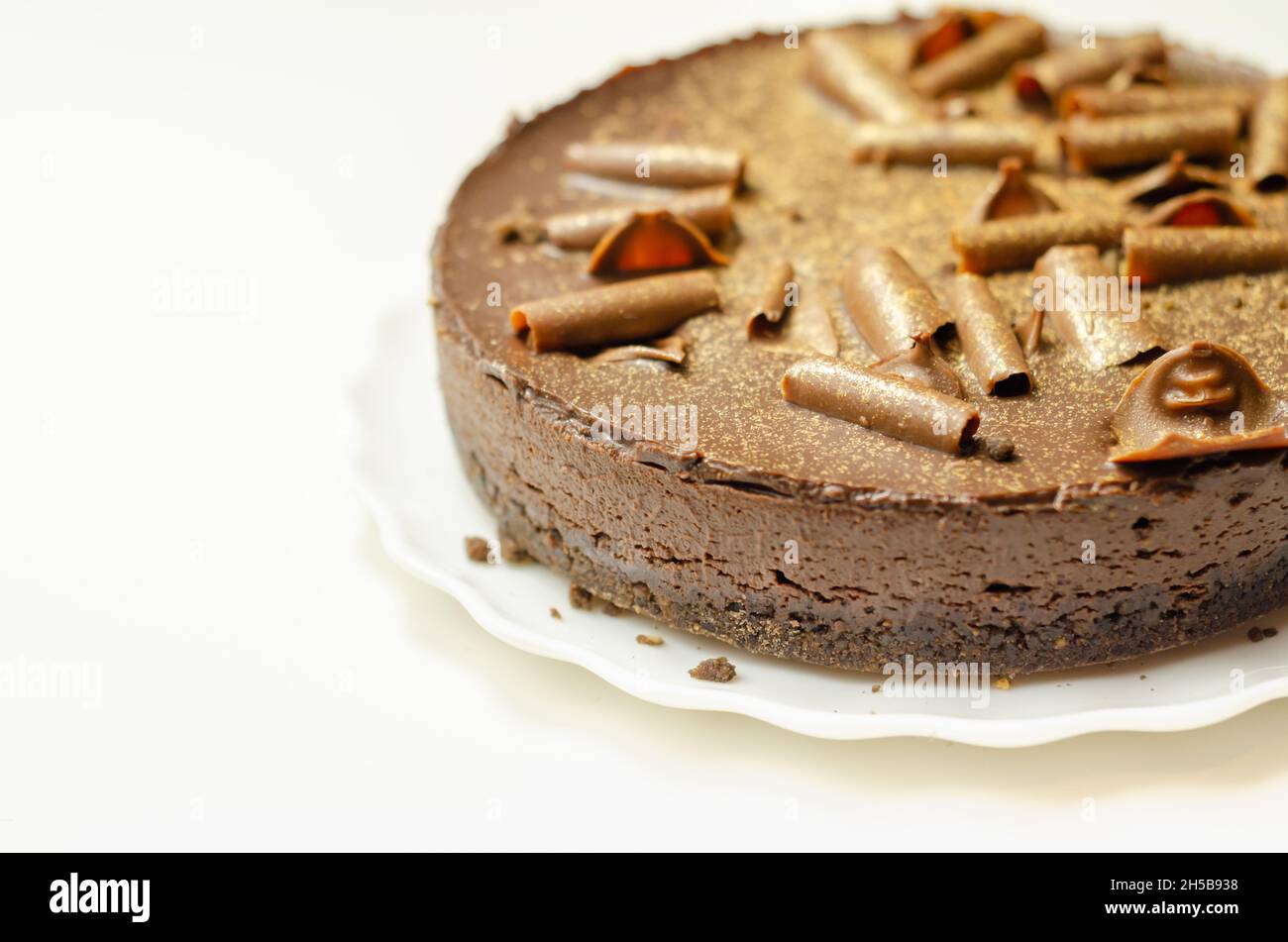 Digestive biscuit base with chocolate cheesecake and pockets of salted