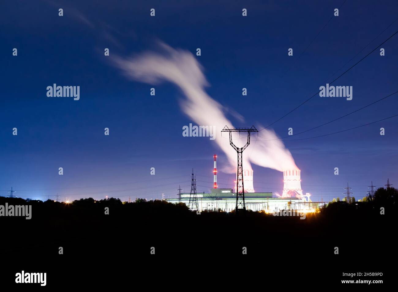 nuclear energy of the future. Illuminated power plant at night Stock ...