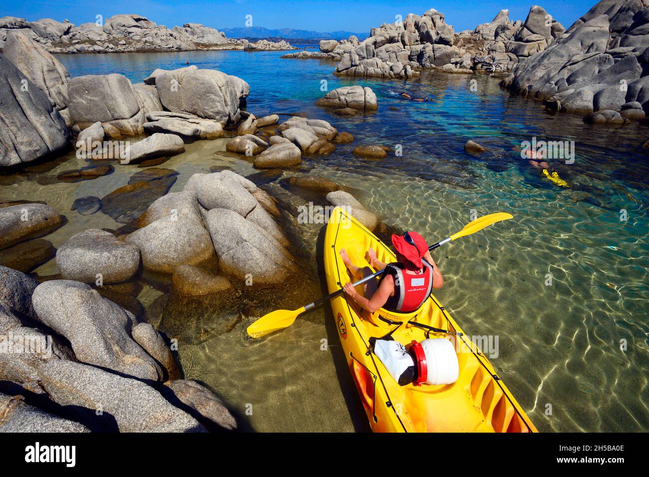 FRANCE, CORSICA ISLAND ( 2A ), BONIFACIO, SEA KAYAK IN THE LITTLE ISLAND OF  LAVEZZI BEETWEEN BIG ROCKS Stock Photo - Alamy