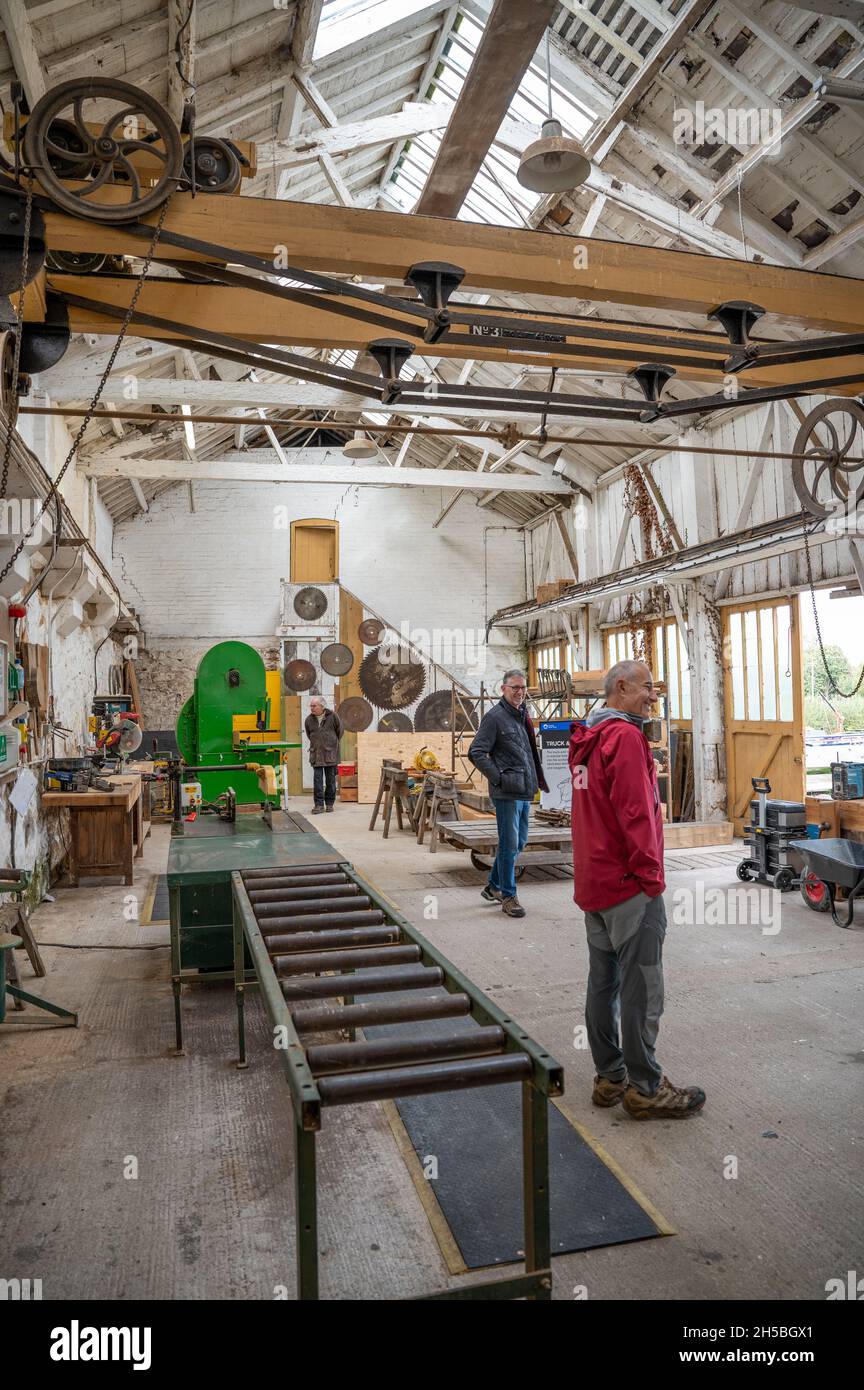 People looking around a workshop at the Canal and River Trust's Yard at Ellesmere, Shropshire. Stock Photo