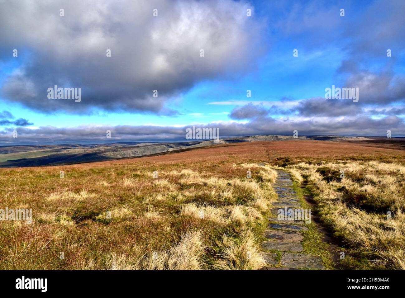 Footpath across High Peak in the Peak District National Park. Stock Photo