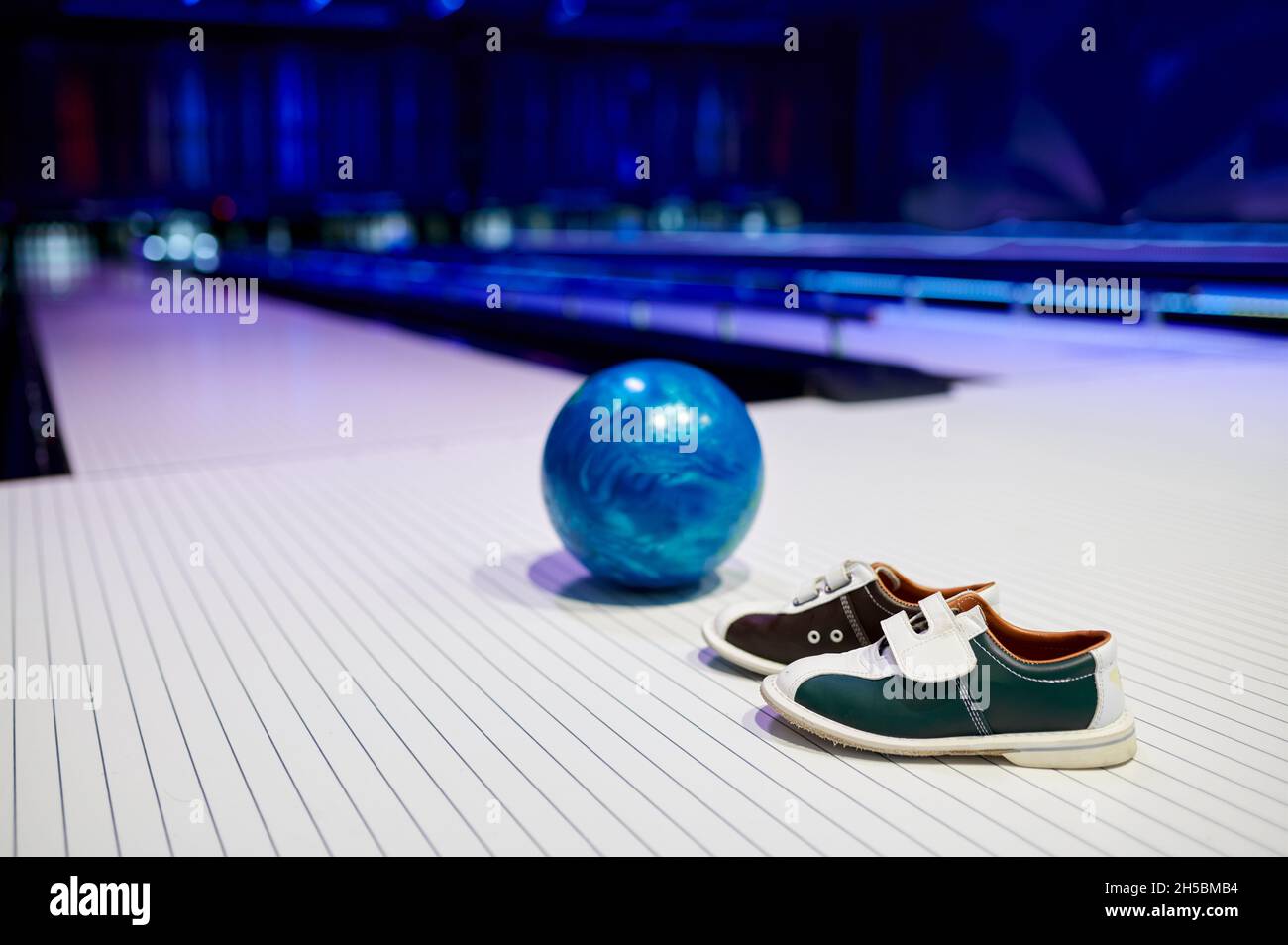 Ball and house shoes, bowling, game concept Stock Photo