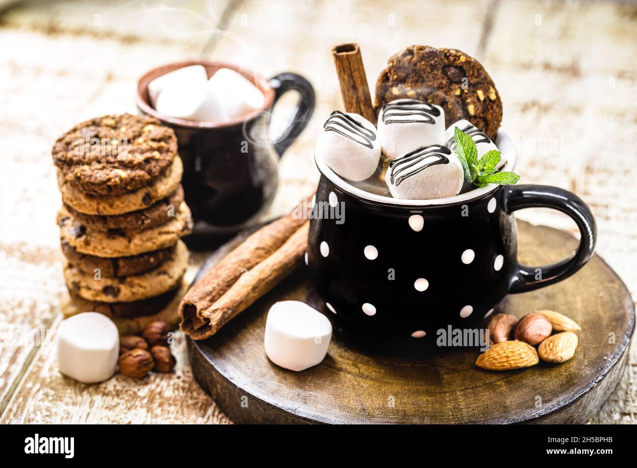 vegan hot chocolate with whole grain cookies, with nuts, cinnamon