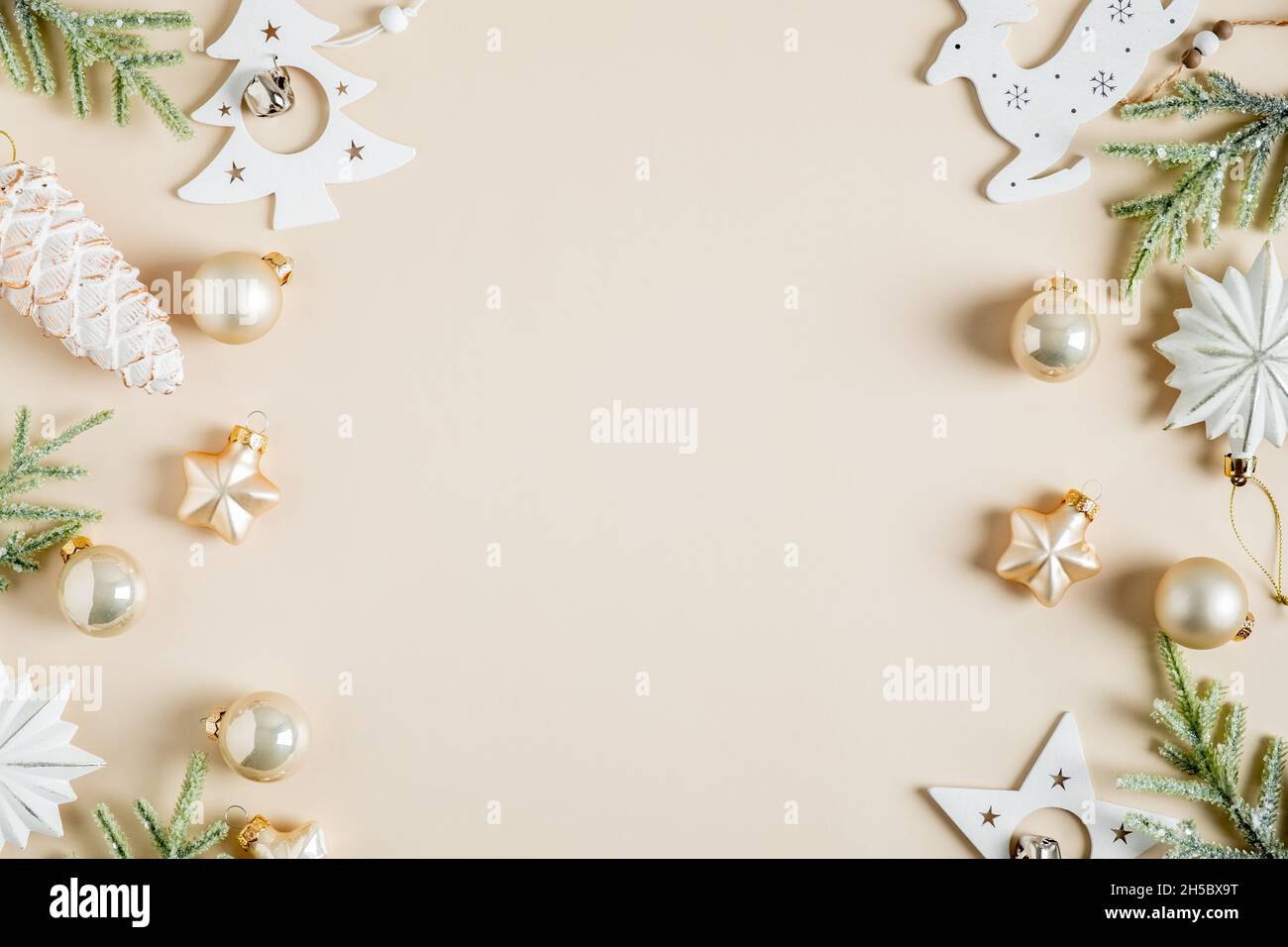 Christmas flat lay composition. Boho style balls, stars, pine cones  decorations on beige background Stock Photo - Alamy