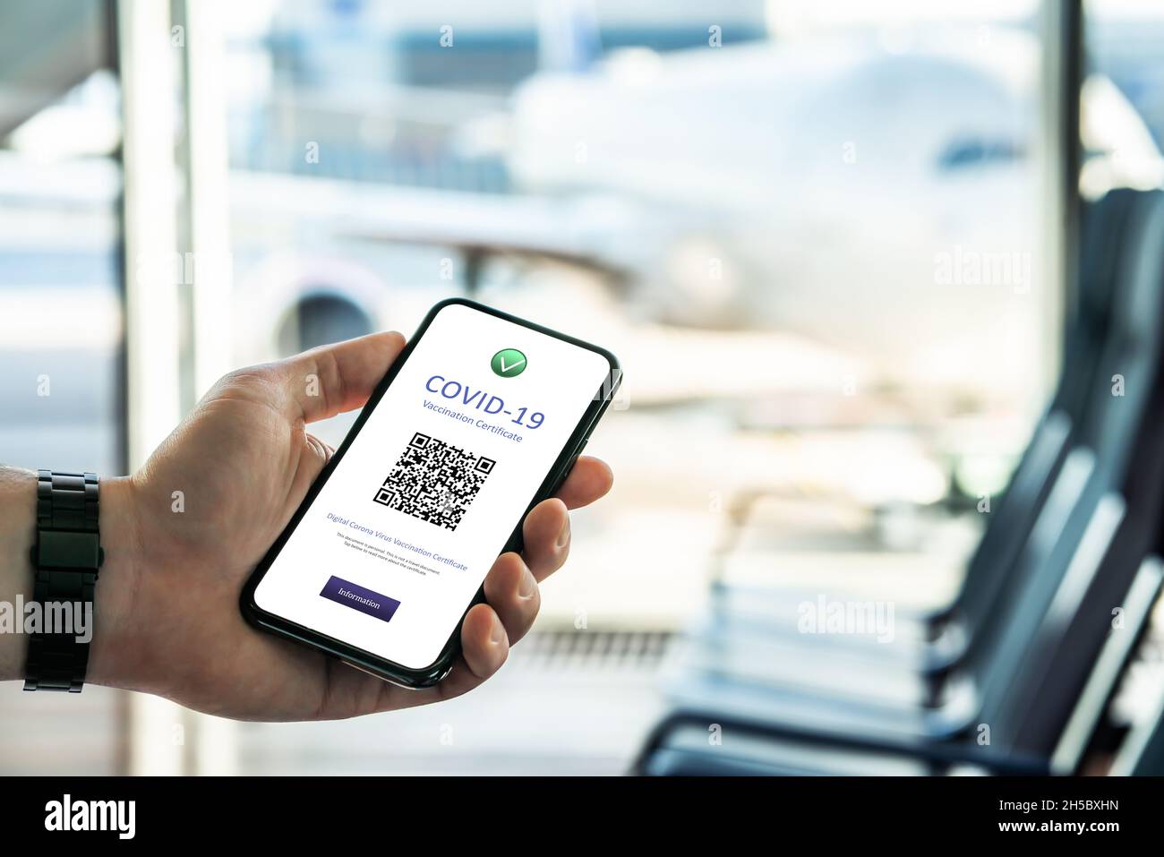 Corona certificate pass about covid vaccine at airport. Digital covid19 passport document in phone. Plane in window before international flight. Stock Photo