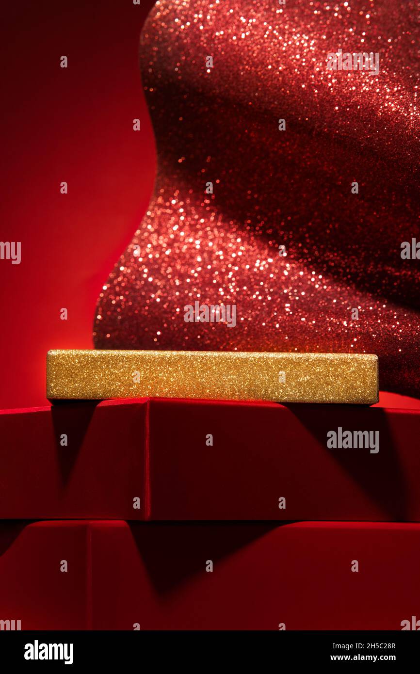 Majestic empty red podium made of gift boxes and shiny decor. Red ...