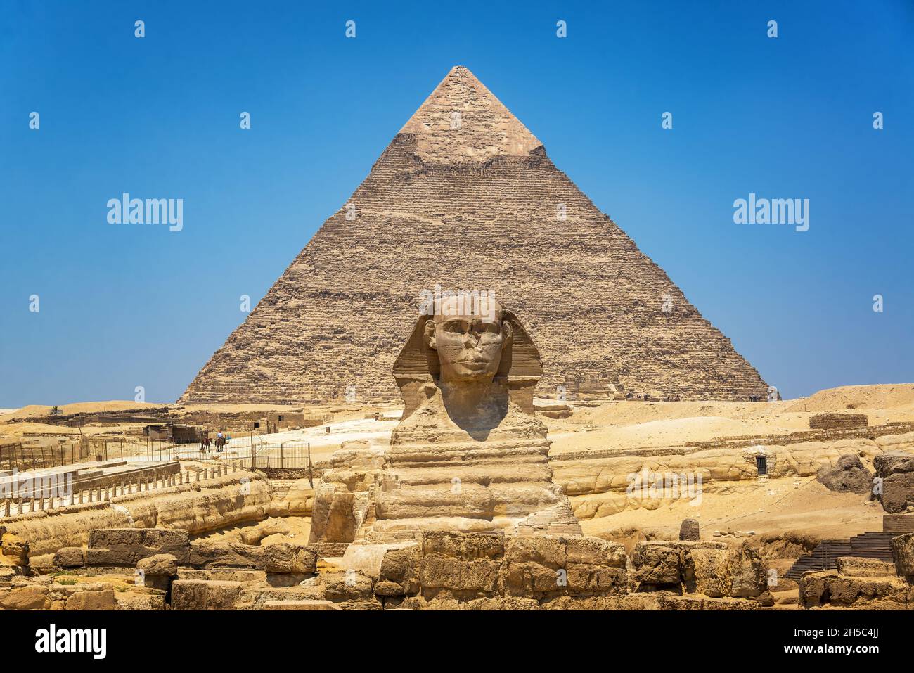 View of the Great Sphinx and Second Pyramid at the Giza Pyramid Complex in Egypt Stock Photo