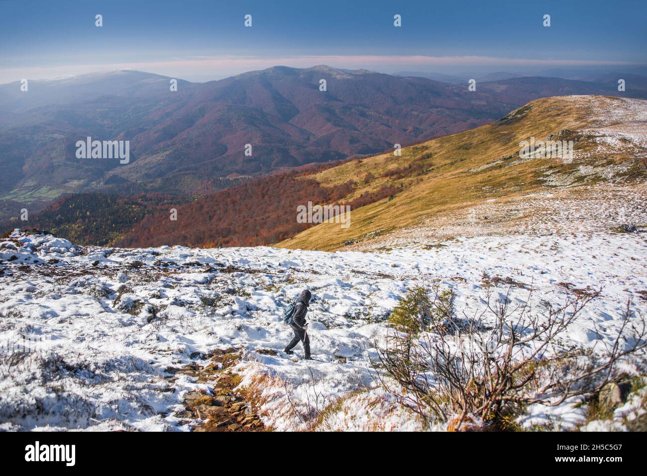 View of hills of vast Water Dividing ridge covered in red, orange and ...