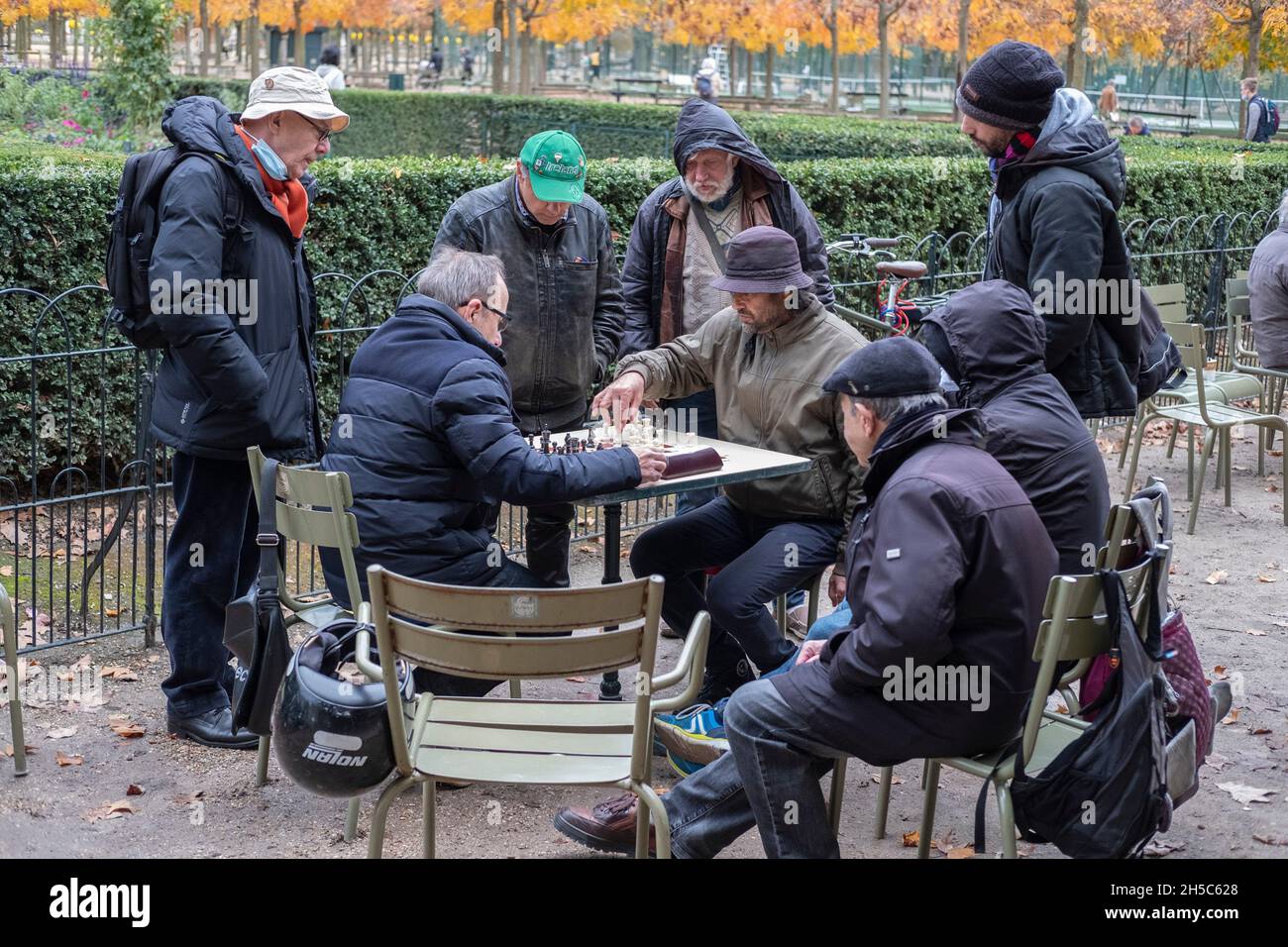 Men play chess in the Jardin du Luxembourg Garden in the 6th