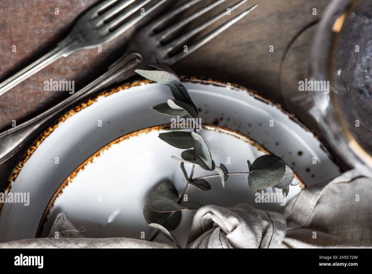 Rustic table setting with Easter eggs for Easter dinner Stock Photo