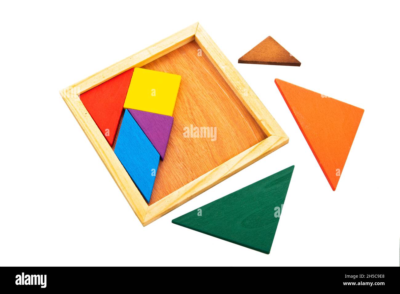 Colorful wooden puzzle isolated over white background Stock Photo - Alamy